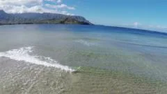 Aerial Breaking Clear Waves in Shallow Water in Kauai Hawaii 1080 Ultra HD Video