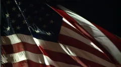 AMERICAN FLAG USA WAVING LITE AT NIGHT IN WIND LONG SLOW MOTION HD