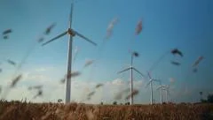 Wind turbines producing renewable energy in the British countryside. 1080p HD