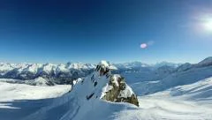 flying over snow covered mountains. aerial view. winter landscape