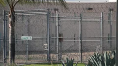 Jail Fencing topped with razor wire