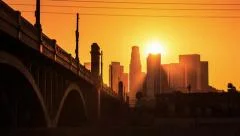 4K. Los Angeles city. Sunset sun over downtown LA skyline. Timelapse hyperlapse.