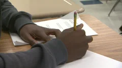 Student Taking Test in Classroom