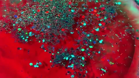 037_Glitter texture with red background.mp4 Stock Footage 345143885