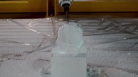 038 production of a 3d model of the head made of foam on a five-axis cnc mac Stock Footage 154897355