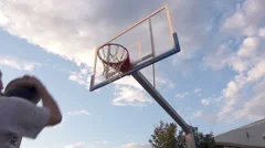 Slow-Mo: Basketball Player Performing A Slam Dunk