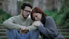 couple makes peace after argument: loneliness,, pain, love