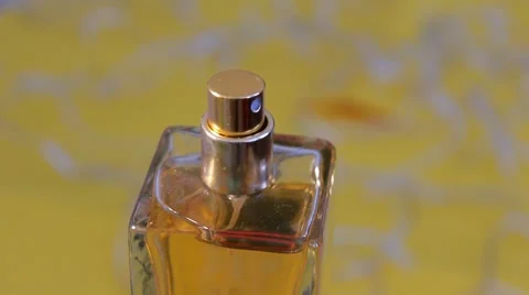 04 - Perfume - Cosmetics - Closeup - Bright colours - 01 Vídeo Stock 62028558