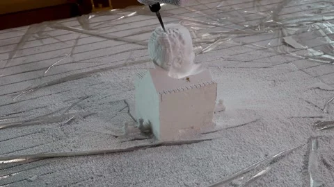 040 production of a 3d model of the head made of foam on a five-axis cnc mac Stock Footage 154897360