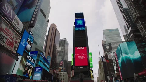 041020 low angle view of Times Square from central skyscraper Manhattan 스톡 동영상 251196258