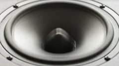 Large black speaker doing a bass test in slow motion