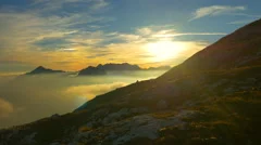 AERIAL: Colorful mountain landscape at sunset