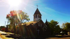Old Fashioned Small Town Catholic Church With Sun Flare