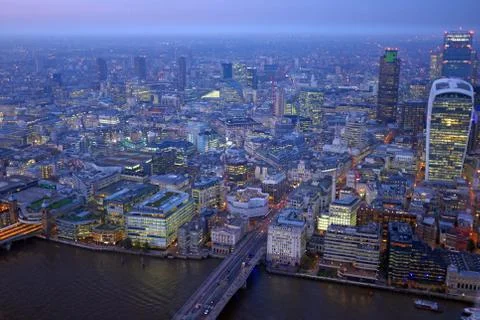 london  rooftop  view  panorama  at  sunset  with  urban  architectures  with  thames  river  at  night xkwx above,  aerial,  architecture,  blue,  britain,  british,  building,  business,  busy,  capital,  city,  cityscape,  clouds,  corporate,  downtown,  embankment,  england,  english,  europe,  famous,  finance,  financial,  high,  kingdom,  landmark,  london,  modern,  of,  office,  old,  pier,  river,  ships,  sky,  skyline,  skyscrapers,  thames,  tourism,  touristic,  tower,  travel,  uk,  united,  urban,  vintage,  water