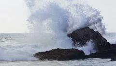 Big wave hits the rock.
