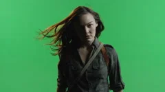 4K Woman with hair blowing in the wind on green screen