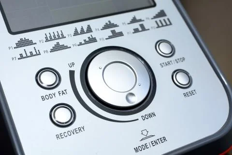 Control panel of the elliptical trainer with buttons and display ...