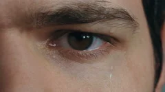 4K - Young men face close up with water / sweat on it