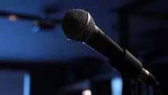 Spot lit Microphone In Crowded Bar, close up