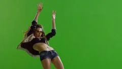 Hot girl dancing. With real strobe lights on body. Slow motion. Green screen.