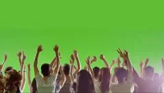 Crowd of fans dancing on green screen. Concert, Dancing, Hands up., Slow motion.