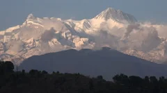 Light fades over Himalayan Annapurna mountain ranges, time lapse, Nepal