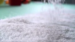 Salt pouring in slow motion