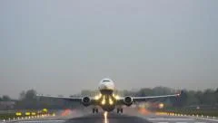 0667 UHD Commercial plane takes off at dawn