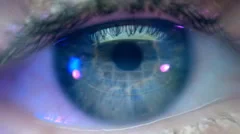 Reflection in the eye of the monitor screen when searching video on the computer
