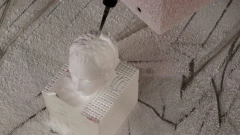 050 production of a 3d model of the head made of foam on a five-axis cnc mac Stock Footage 154897544