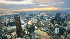 Aerial View Of Melbourne Cityscape During Sunset. Timelapse, Zoom In