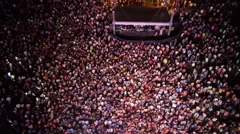 AERIAL: People partying on an outdoors music concert