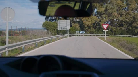 05.02.2025 - Tarifa, Spain. View from inside a car driving on a rural road. Stock Footage 299910981