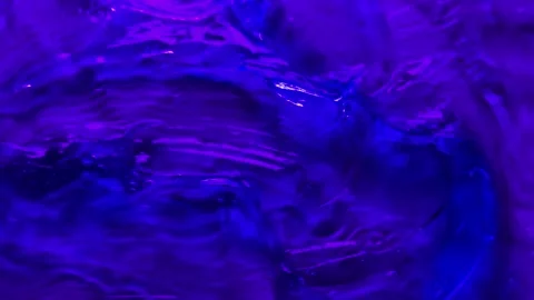 050_Vibrant purple abstract liquid texture.mp4 Stock Footage 345153648
