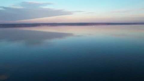 051 Boat and sky reflection in the water. Sunset Stock Footage 166573492