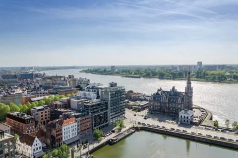 Aerial  view  over  the  city  of  Antwerp  in  Belgium  from  Museum  aan  de  Stroom. xkwx aan,  above,  aerial,  ages,  amberes,  antwerp,  antwerpen,  anvers,  architecture,  baroque,  belgian,  belgium,  building,  cathedral,  catholic,  church,  city,  de,  europe,  european,  famous,  flanders,  flemish,  from,  gothic,  harbor,  historic,  history,  house,  lady,  landmark,  medieval,  middle,  museum,  our,  outdoors,  overview,  pilotage,  port,  river,  roof,  scene,  schelde,  sky,  skyline,  stroom,  urban