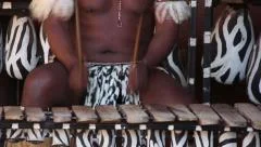 Traditional man playing the Marimbas