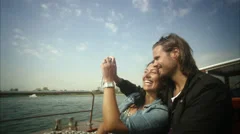 MS POV Young couple taking self portrait in boat / Copenhagen, Denmark,