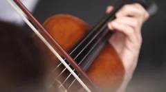 violin playing close up