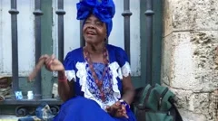 Black Lady Dancing with Cigar in Havana, Cuba