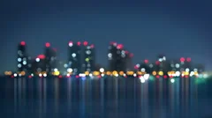 waterfront of city at night blurred loopable 4k (4096x2304)