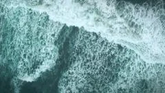 Aerial shot of rolling ocean waves