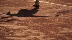 Tennis player shadow on the ground, stock video
