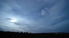4K Night Time Lapse of Moonlight and Feathery Clouds