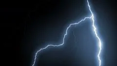 Several lightning strikes over black background. Blue. Electrical Storm.