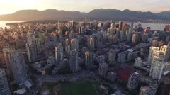 4K aerial Vancouver Skyline Sunset global backward view