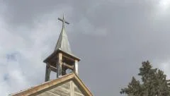 4K Wooden Church Chapel 1800's Cross Steeple Bell Tree Clouds Windy Close Up