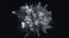 White powder/particles fly after being exploded.  4K 30fps. Slow Motion.