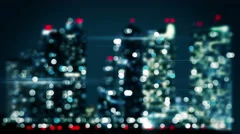bicolor blurred lights of skyscrapers in night city loop 4k (4096x2304)