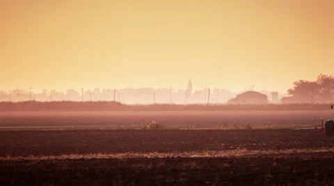 0557 Tractor sowing at dusk Stock Footage 43330570